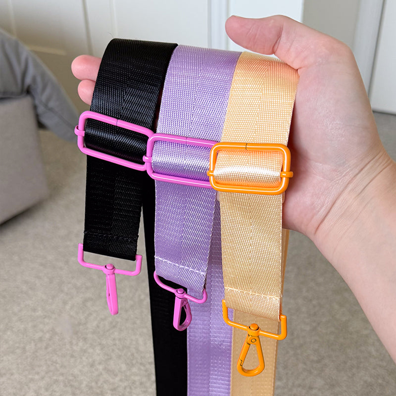Sprinkle Club - Black adjustable bag strap with pink hardware, designed for Sprinkle Club sherpa bags