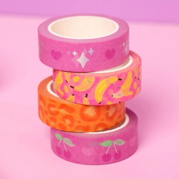 Sprinkle Club - A stack of four colourful washi tape, with the designs of pink hearts and holographic stars, yellow bananas with a pink background, an orange leopard print design and a pink cherries and love hearts
