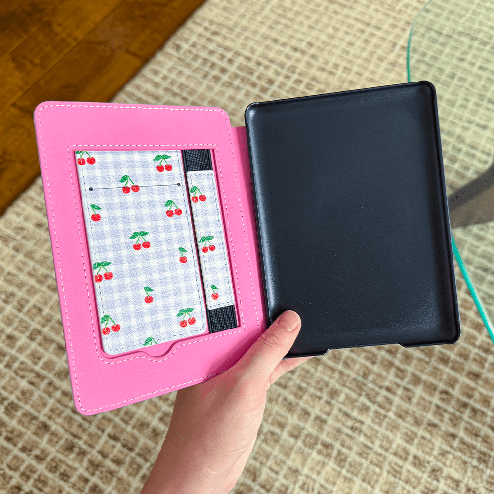 Sprinkle Club - Pink kindle paperwhite case opened up with cherry pattern