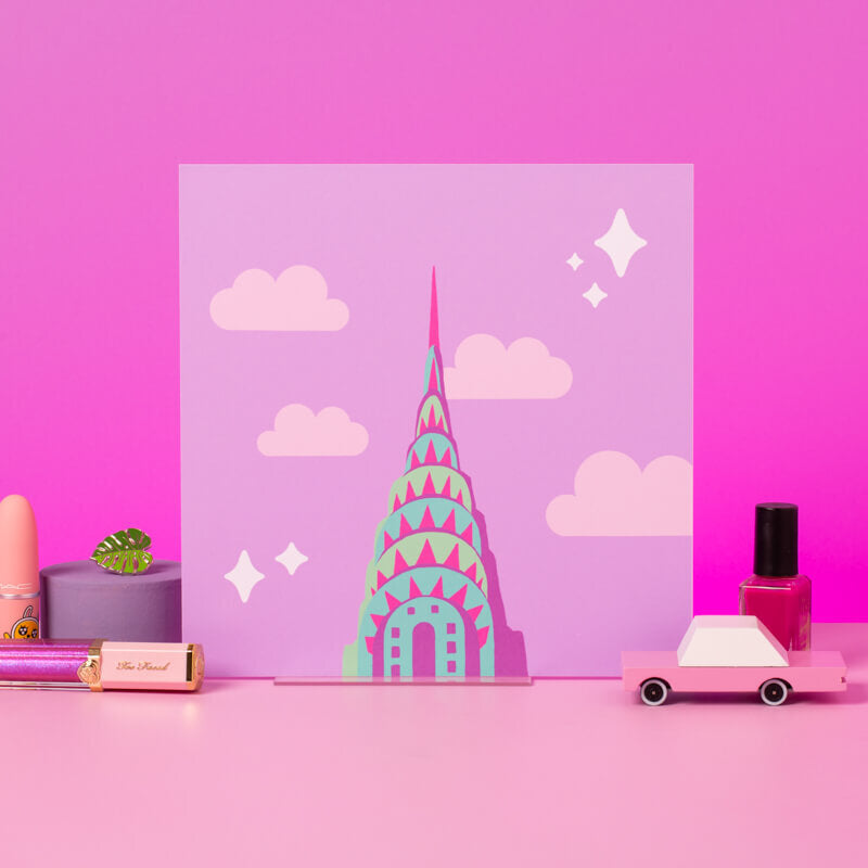 Sprinkle Club - A bold and bright illustration of the iconic Chrysler building in New York City in a pop art style