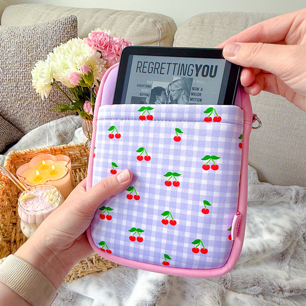 Sprinkle Club - Kindle e-reader tucked inside a cherry gingham padded book sleeve with pink trim