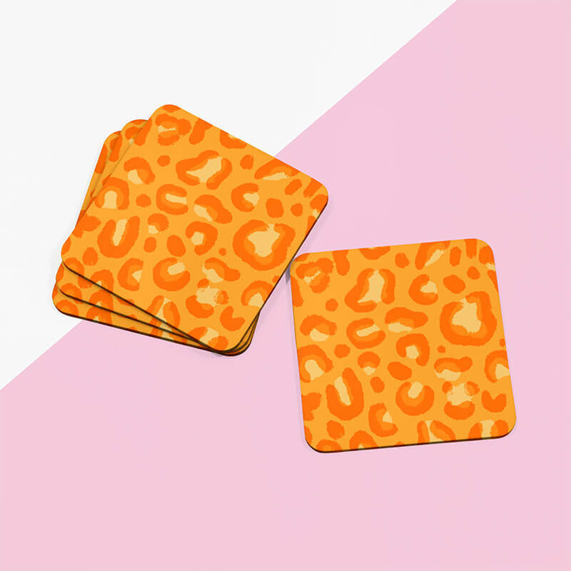 Sprinkle Club - A set of 4 orange leopard print trendy drinks coasters