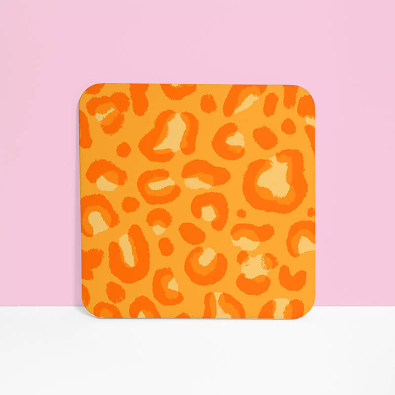 Sprinkle Club - Bright orange leopard print drinks coaster 