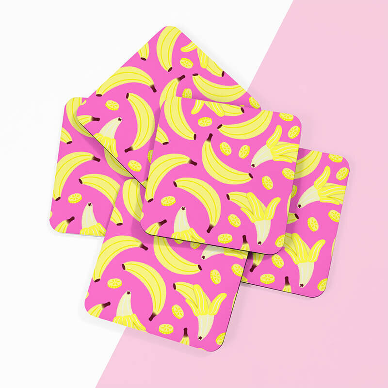 Sprinkle Club - A collection of fun and trendy pink and yellow banana print drinks coasters