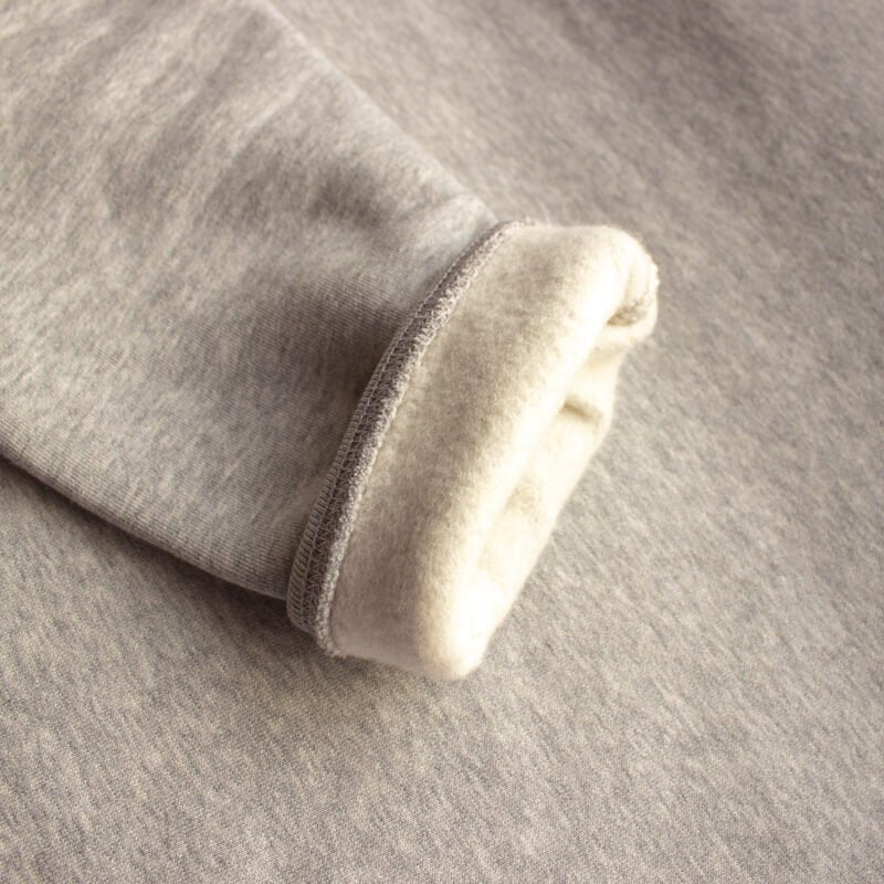 Sprinkle Club - A women's grey organic cotton sweatshirt inside sleeve