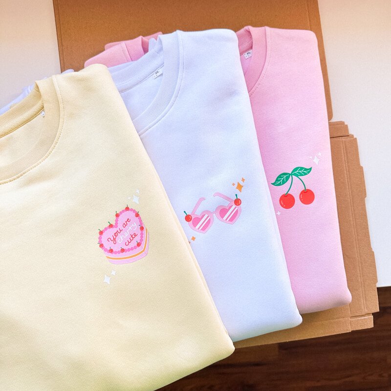 Sprinkle Club - A collection of pastel yellow, pink and white valentine's sweatshirts